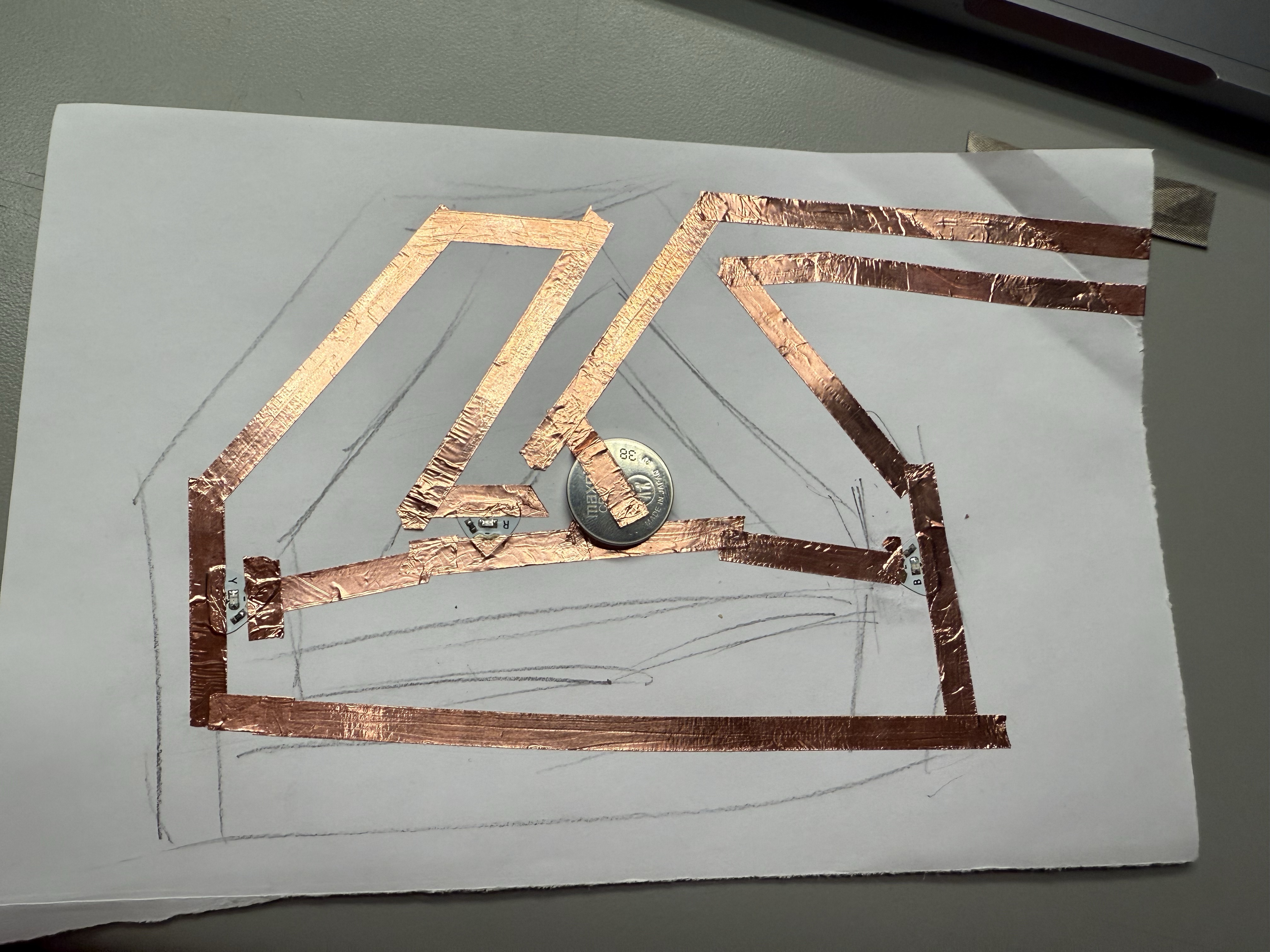 Example of a completed circuit using copper tape and basic electronics.