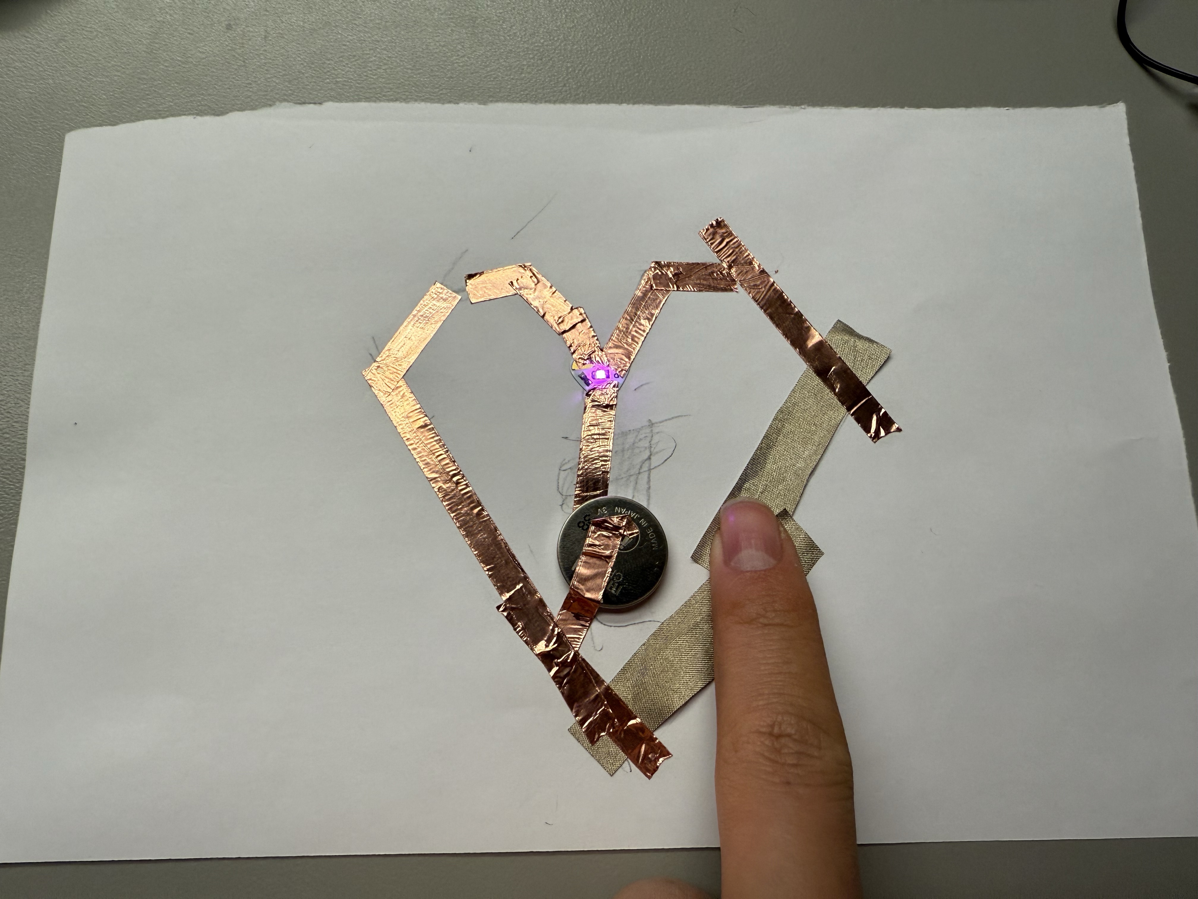 LED stickers glowing in a heart circuit