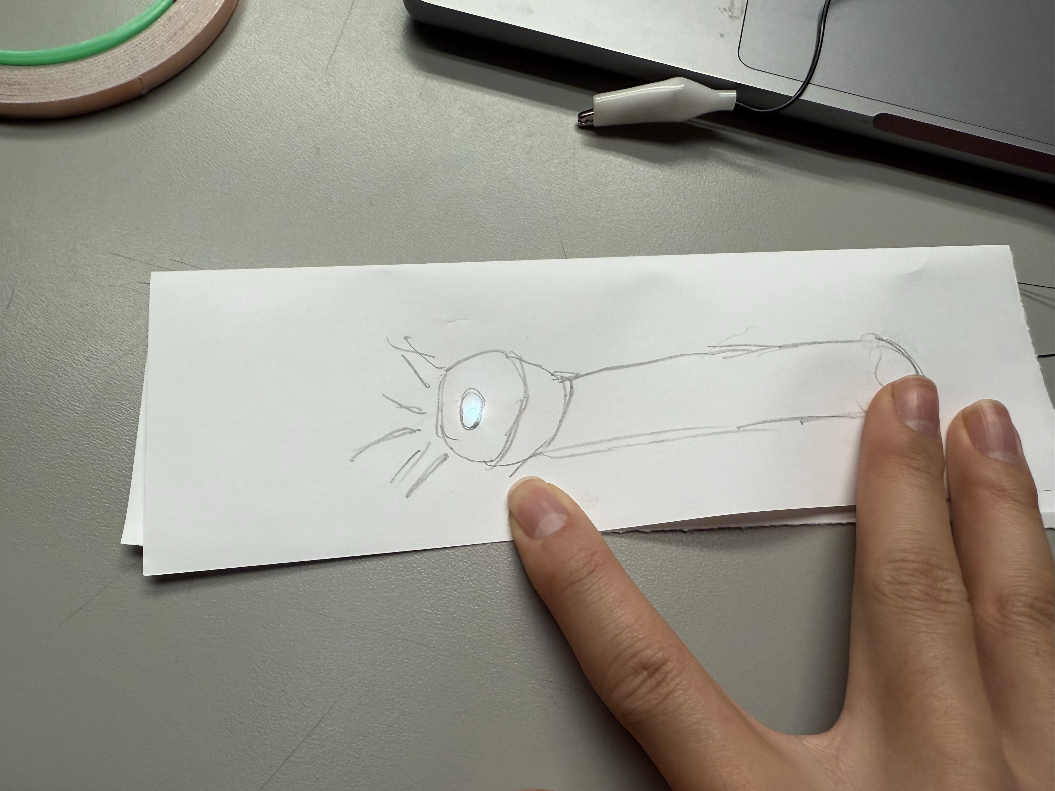 Layered touch like design of copper tape paths for a functioning circuit.