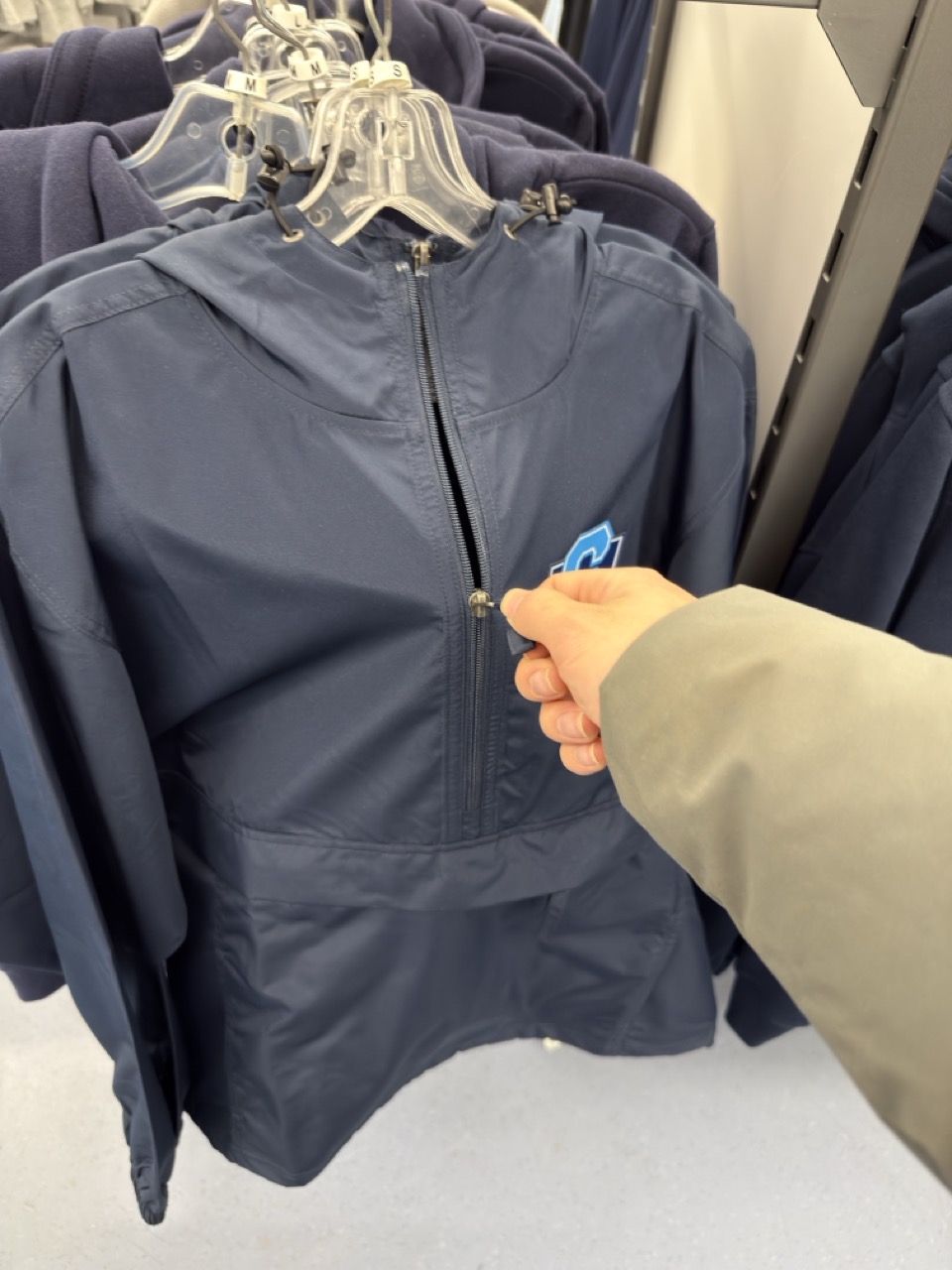 hand flipping a temprature knob to turn it on or off.