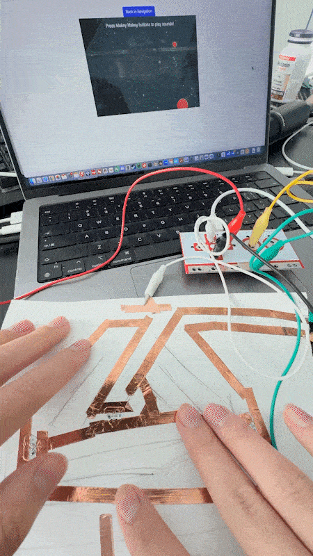 A Makey Makey touch-sensitive game testing user reaction speed.