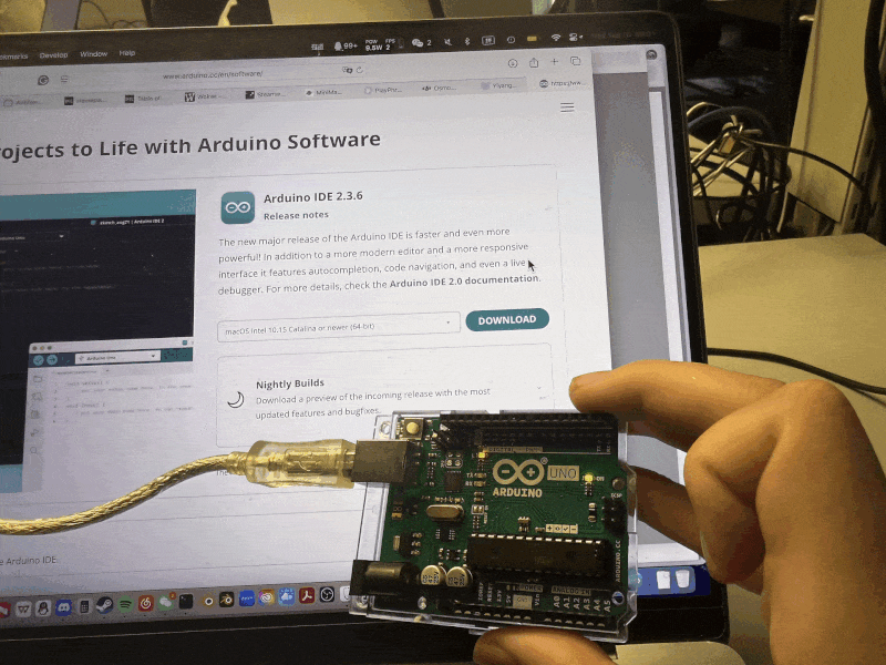 Connecting the Arduino to the computer and installing/opening the Arduino IDE. The Uno is plugged in with a USB cable.
