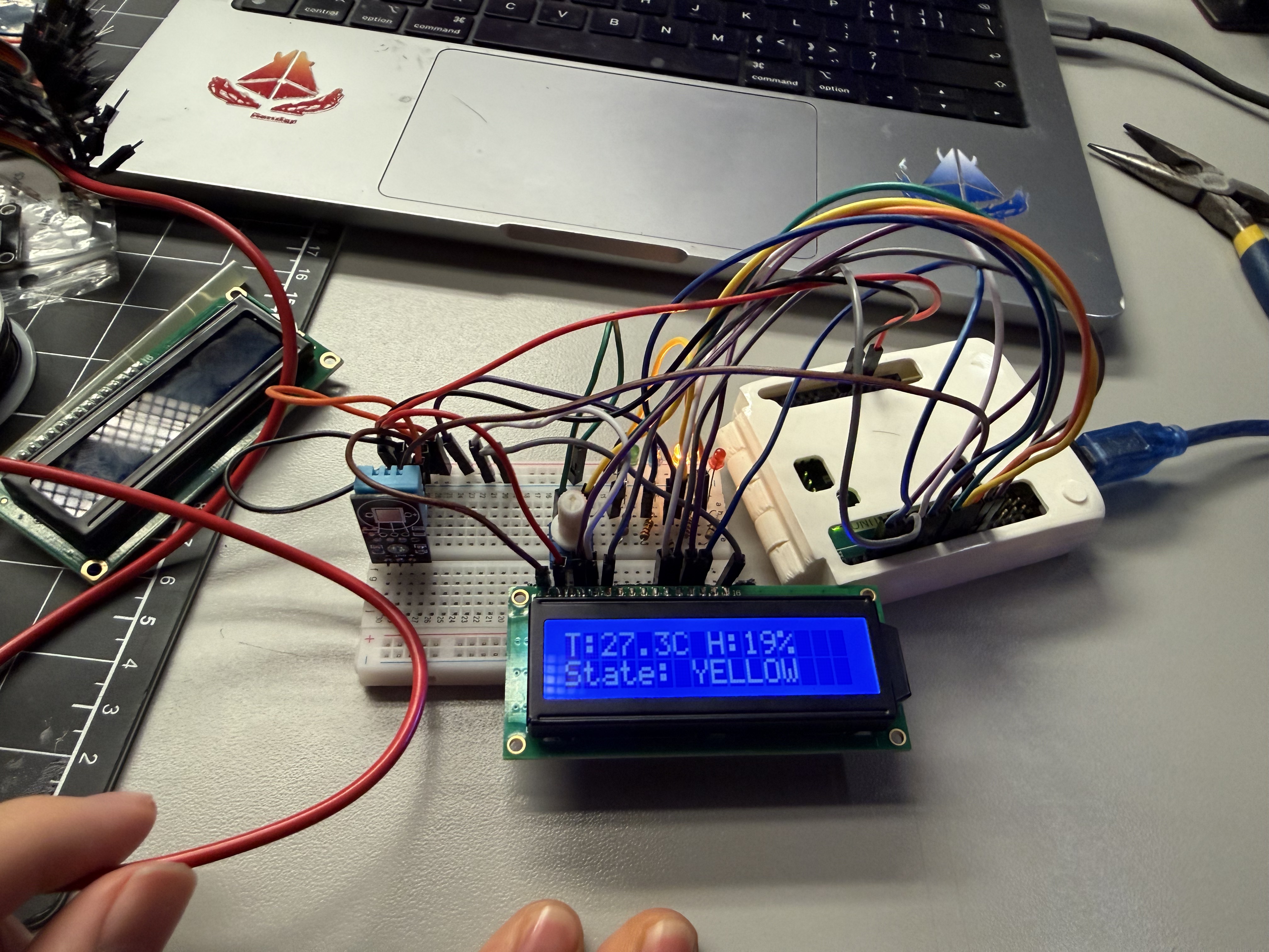 LCD readout: T, H, and tier label