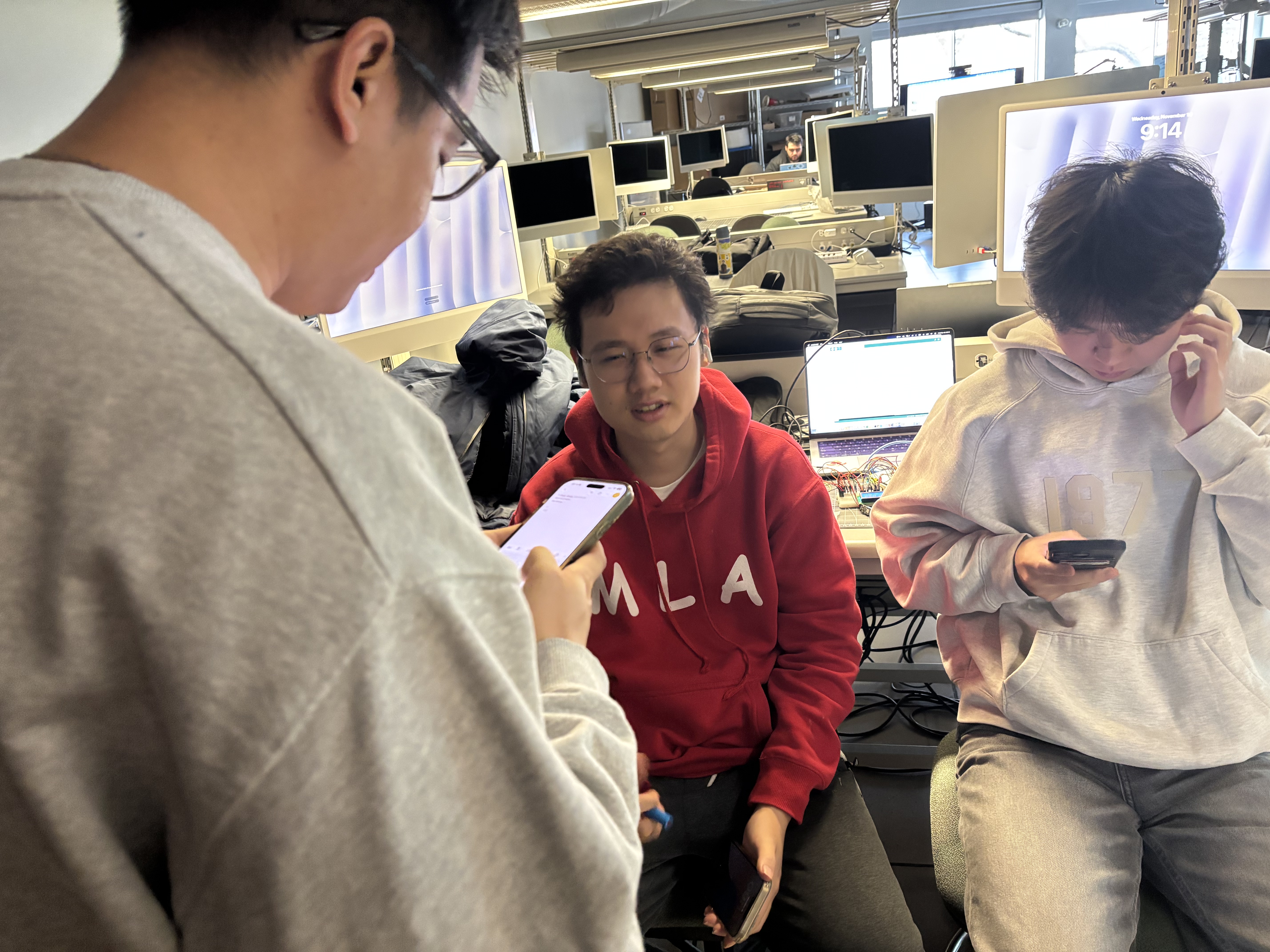 Doctor reads symptom checklist on phone